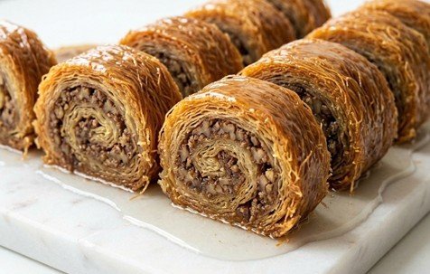 Domaći Rolani Kadaif: Muchmuche suto ar mishti rasher opurbo milon